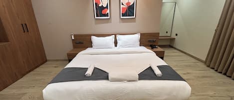 Family Room, City View | Premium bedding, memory foam beds, minibar, desk