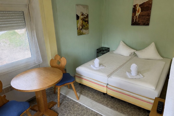 Desk, WiFi (free), bed sheets
