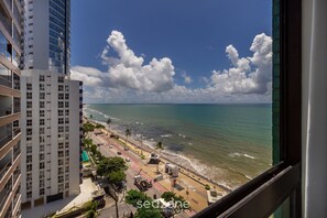 A high-rise building with a view of the beach and ocean. - Luxury Beachfront Apt in Boa Viagem - Iaa1002 (Recife)