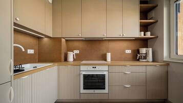 Apartment, 1 Double Bed with Sofa bed | Private kitchenette | Fridge, stovetop, cookware/dishes/utensils