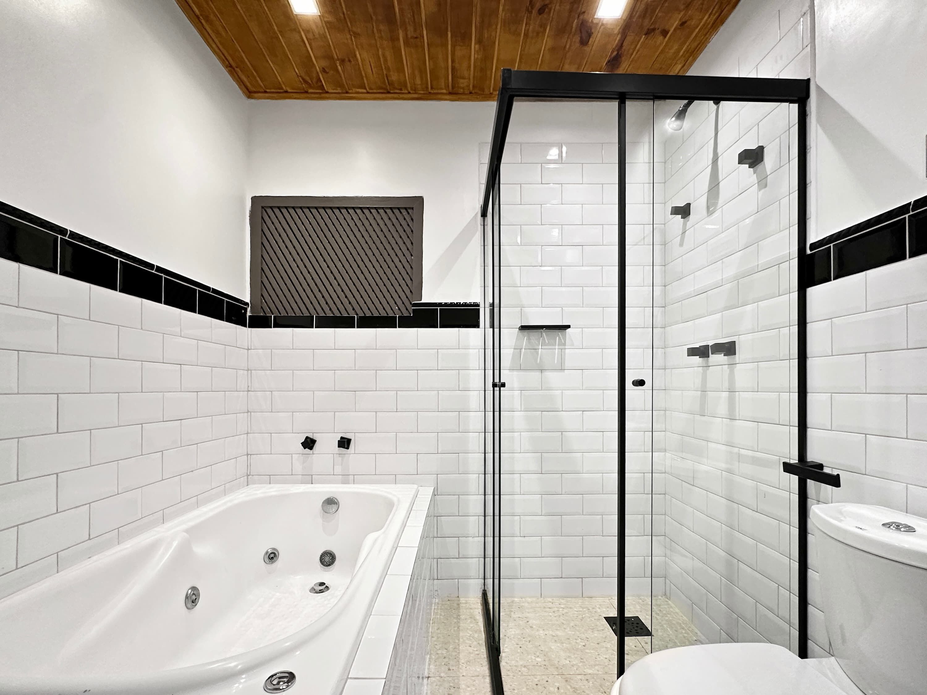 Shower, hair dryer, towels, shampoo