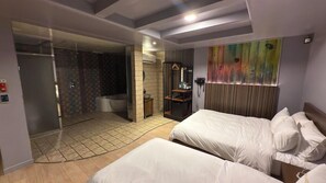 A hotel room with two beds, a shower area, and a bathroom. - Cleopatra Hotel (Goyang)