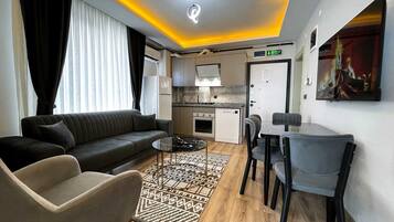 Appartement Familial, 1 chambre, coin cuisine, vue ville | Intérieur