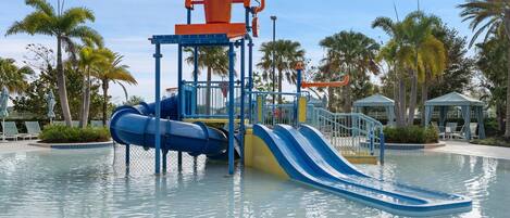 A water park with slides and a pool.