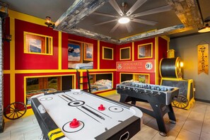 A room with a foosball table, a pool table, and a sign reading 'Hogwarts Express.' - Championsgate 923 - Eight Bedroom Villa, Sleeps 20 (Orlando)