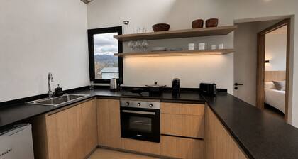 Suite Patagonia Terrace | 1-bedroom boutique apartment for families in San Martín de los Andes | Mountain views, balcony & BBQ | Chapelco Ski Resort