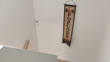 A staircase with wooden steps leading to a landing.