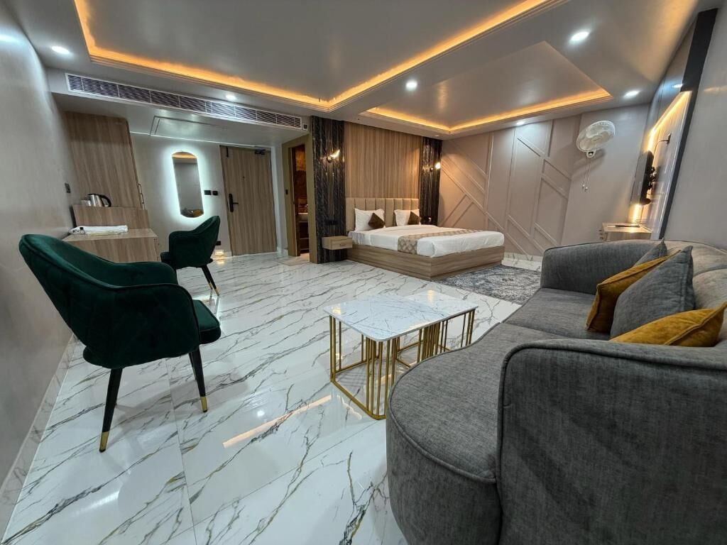 Suite, City View | In-room safe, desk, laptop workspace, iron/ironing board (on request)