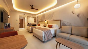A modern hotel room with a bed, sofa, and a dining area.