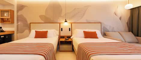 A hotel room with two beds, a nightstand, a telephone, and a wall-mounted light fixture.
