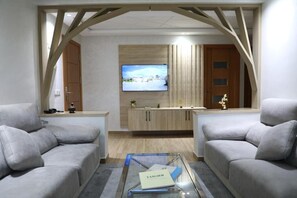 Family Apartment, Balcony, City View | Living area | Printers - welcome house appart hotel (Tanger)