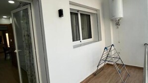 Familienapartment, Balkon, Stadtblick | Innenbereich