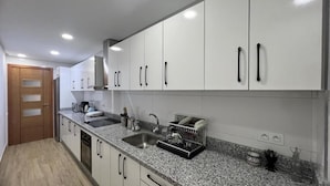 Familienapartment, Balkon, Stadtblick | Eigene Küche
