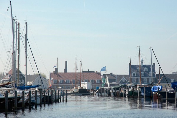 Breathe in marina air as boats bob in morning light.