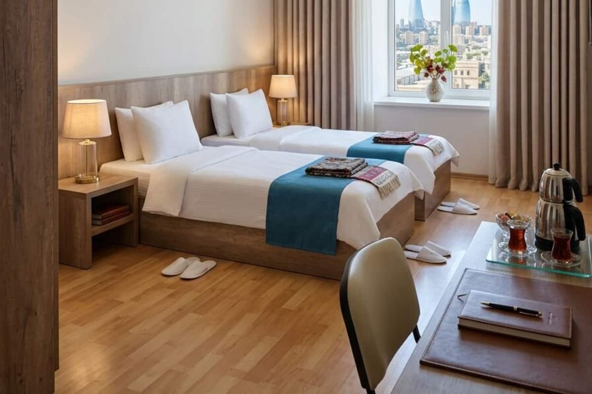 Deluxe Double or Twin Room, Balcony, City View | In-room safe, desk, laptop workspace, blackout curtains