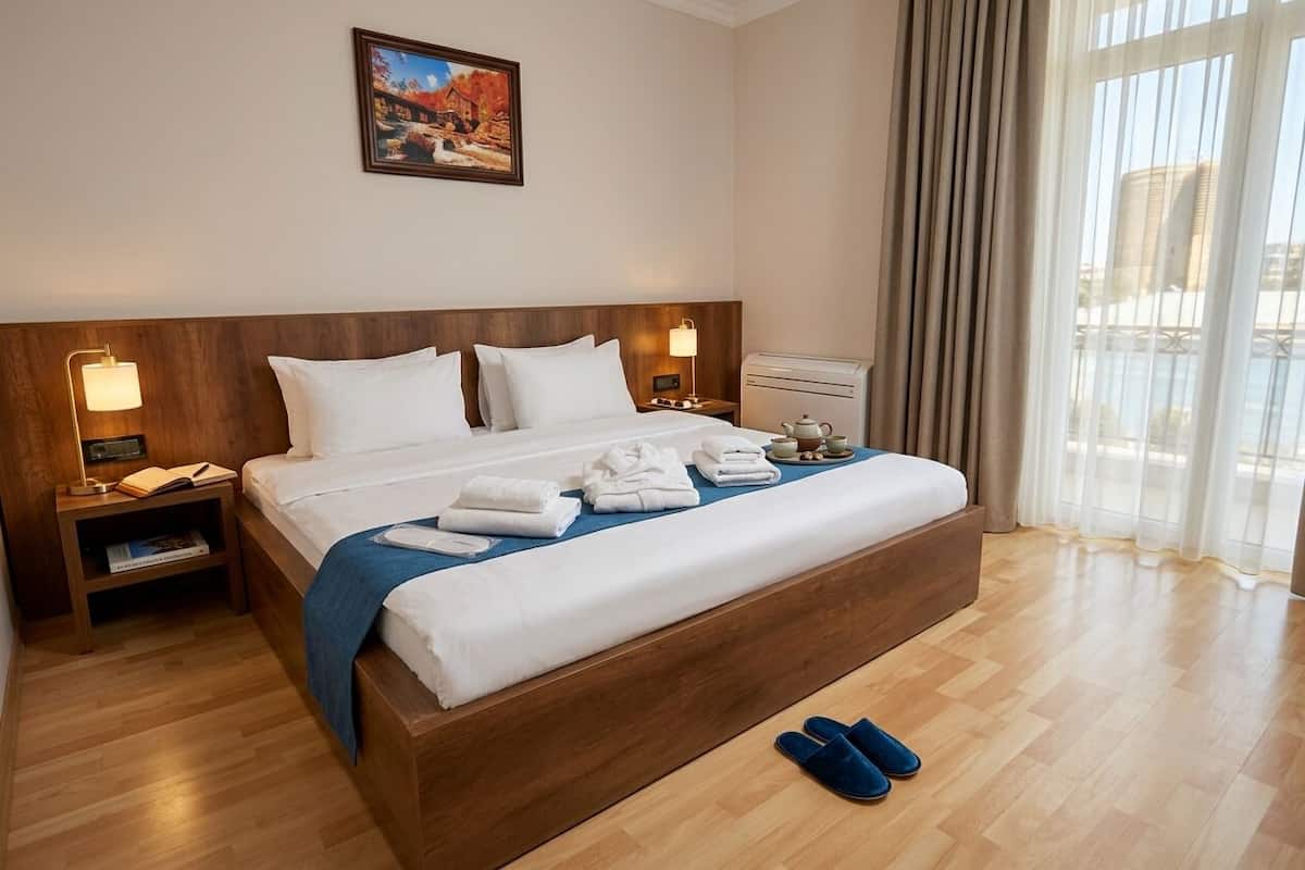 Standard Double or Twin Room, City View | In-room safe, desk, laptop workspace, blackout curtains