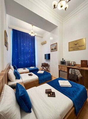 In-room safe, desk, laptop workspace, blackout curtains - Grand Liman Hotel (Baku)