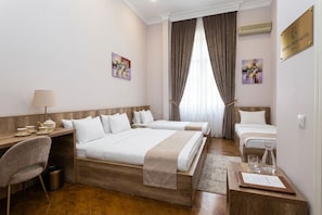 In-room safe, desk, laptop workspace, blackout curtains - Grand Liman Hotel (Baku)