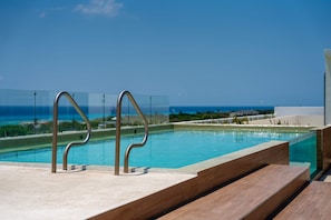 Unclassified image, 3 of 27, button - Musa del Carmen · Modern 1BR Pool & Hot tub Access (Playa del Carmen)