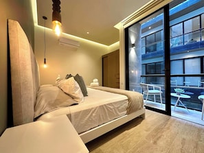 Unclassified image, 5 of 27, button - Musa del Carmen · Modern 1BR Pool & Hot tub Access (Playa del Carmen)