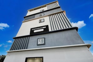 A multi-story building with a sign reading 'Townhouse Oak.' - Deluxe Townhouse Saroornagar (Hyderabad)