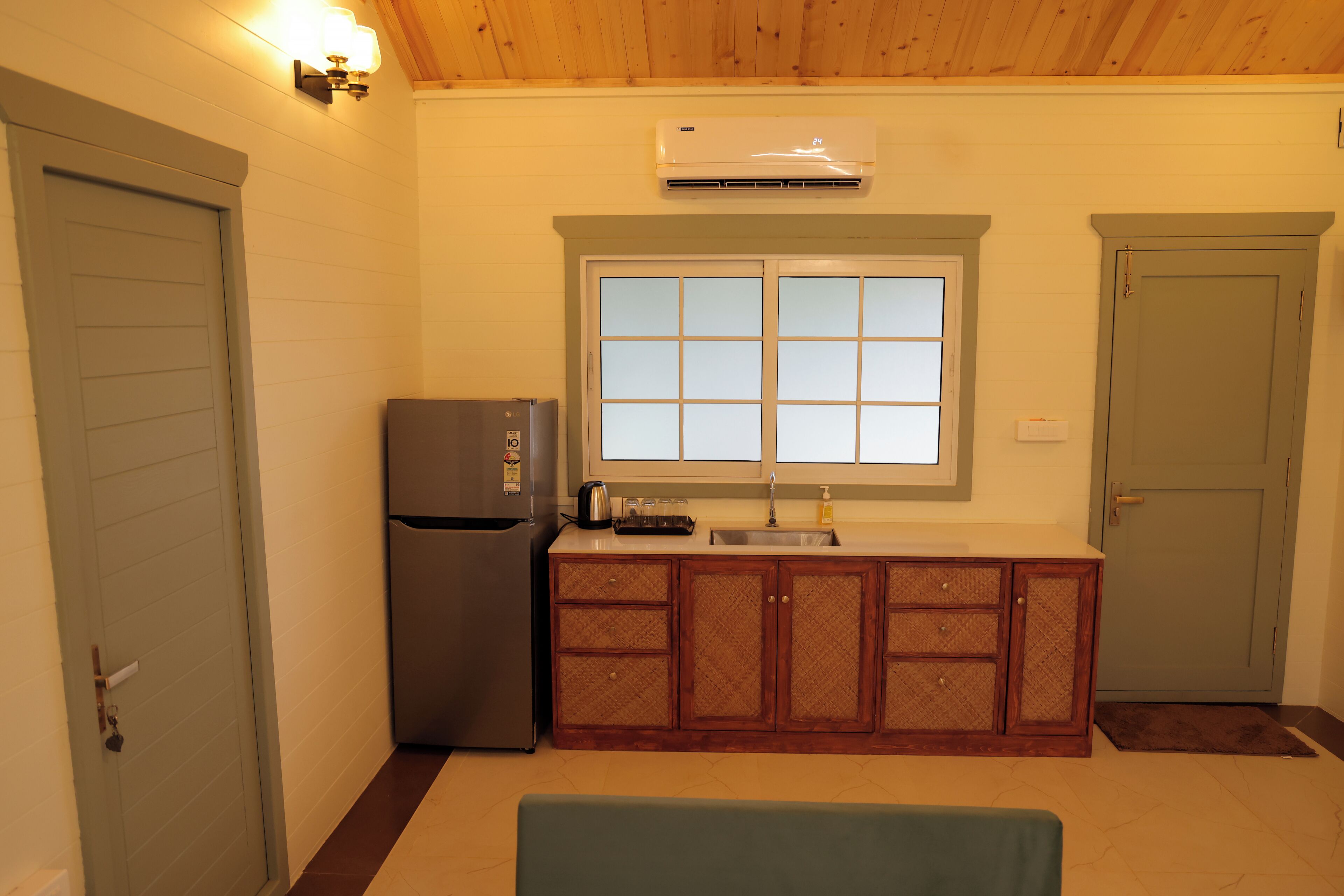 Executive Cottage, Garden View | Living area | LCD TV, printers