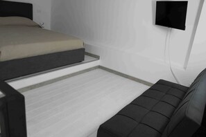 Tabla de planchar con plancha, wifi y ropa de cama 