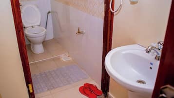 Shower, free toiletries, slippers, towels