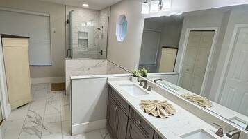 Shower, hair dryer, towels, soap