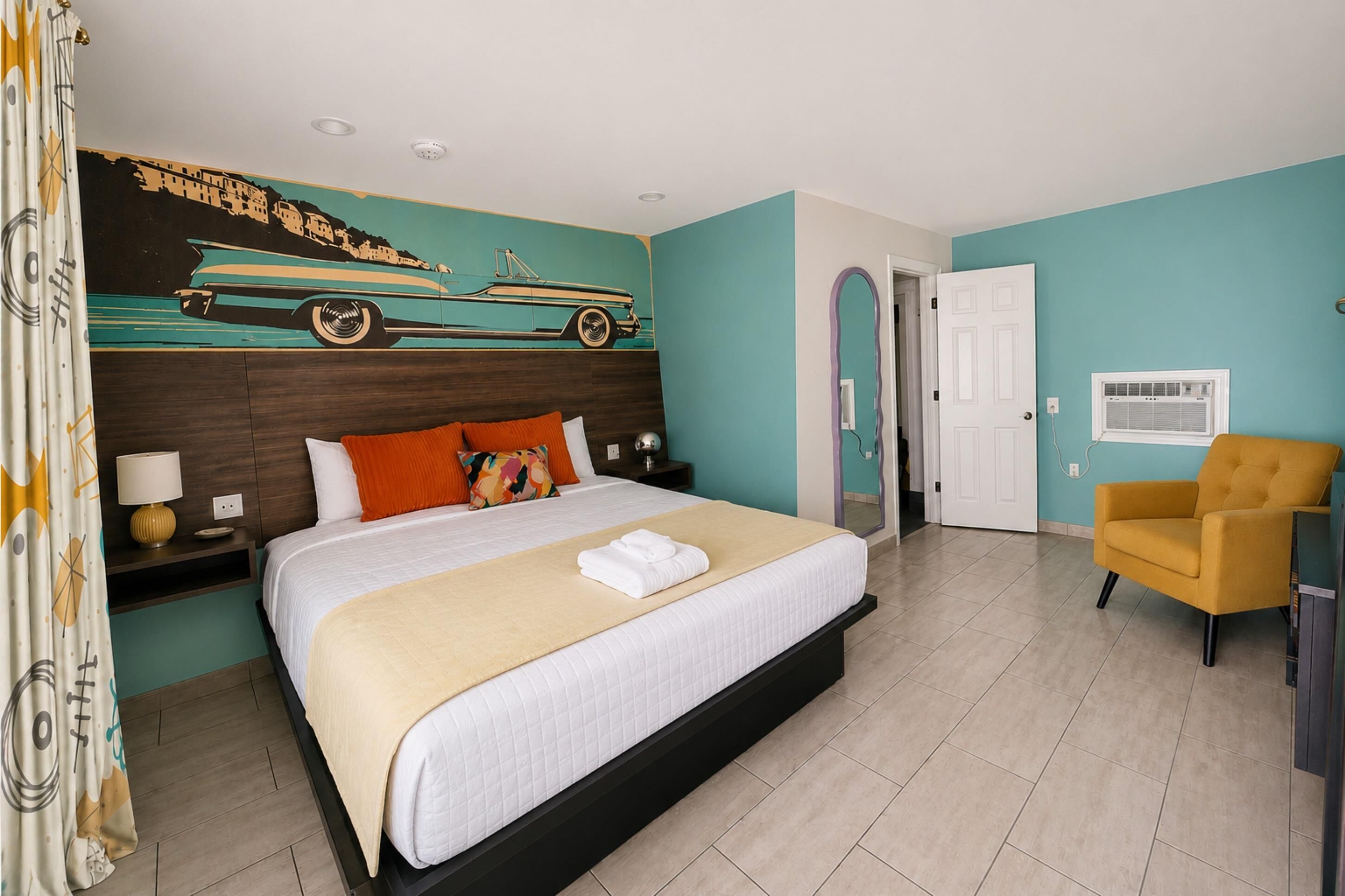 Studiosuite, 1 King-Bett, Terrasse | Bügeleisen/Bügelbrett, kostenloses WLAN, individuell dekoriert