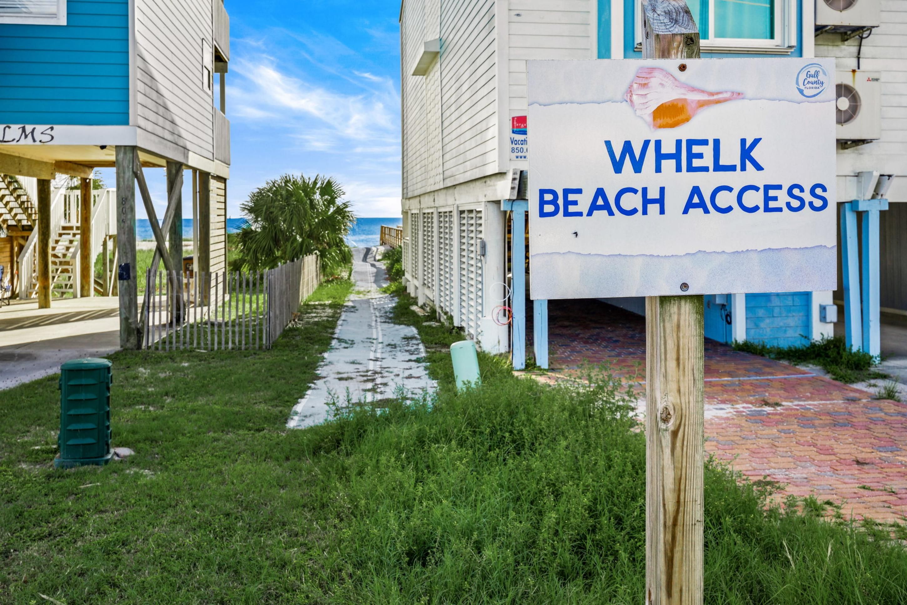 Placa de acesso à praia de Whelk Beach.