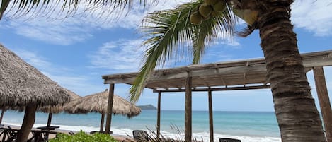 On the beach, sun loungers, beach umbrellas, beach towels