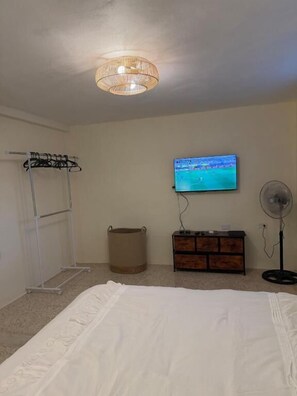 Apartment, Patio, Garden View | Iron/ironing board, WiFi (free)