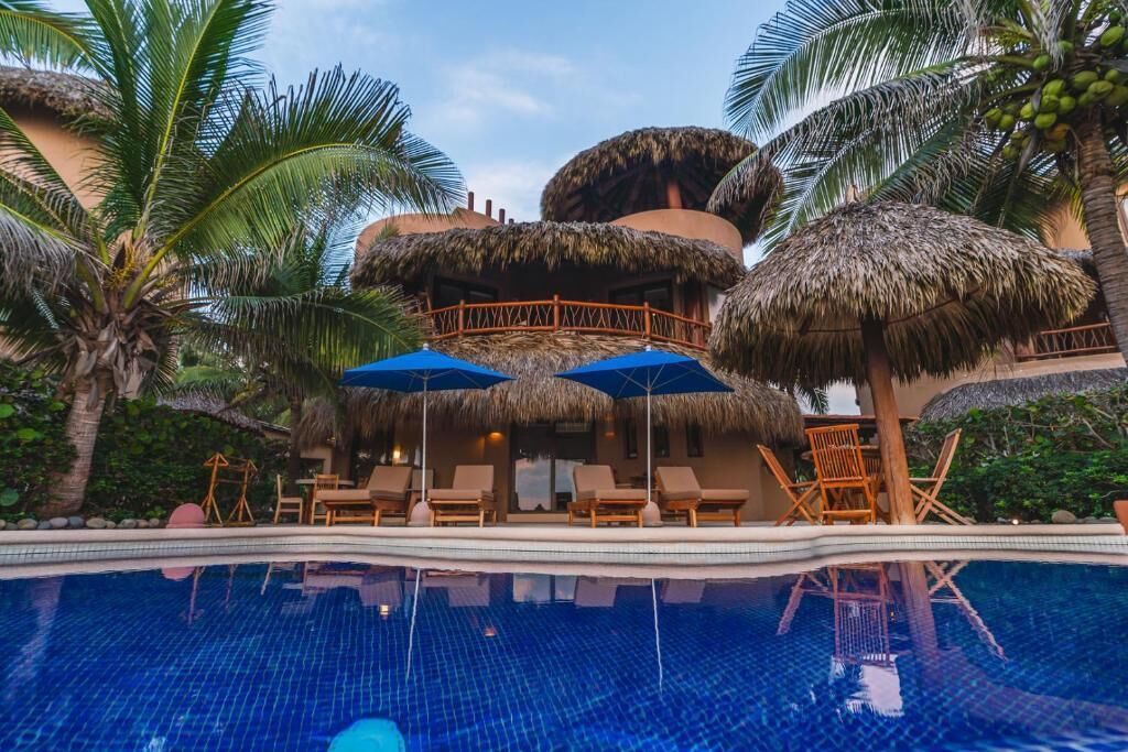 Luxury Villa, Patio, Beach View | Pool | 2 outdoor pools