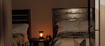 Enjoy a cozy stay in our Cabin Room at U.P. Trails Getaway