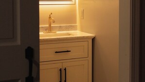Shower, towels, soap, toilet paper