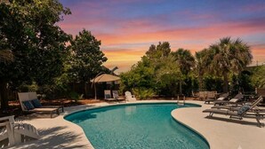 A swimming pool with lounge chairs and a sunset sky. - Blue Mountain View | Private Pool, Rooftop Deck & Bikes (Santa Rosa Beach)