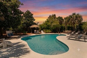 A swimming pool with lounge chairs and a sunset sky. - Blue Mountain View | Private Pool, Rooftop Deck & Bikes (Santa Rosa Beach)