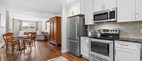 Coffee/tea maker, fridge, microwave, oven