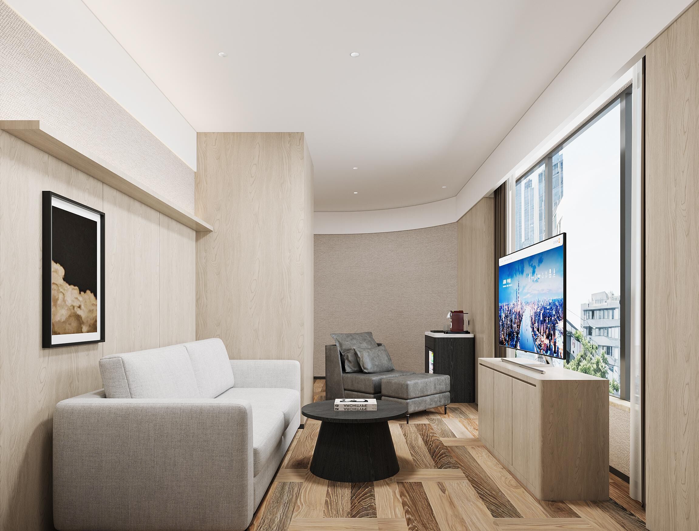 A modern living room with a sofa, armchair, coffee table, and a large TV screen.