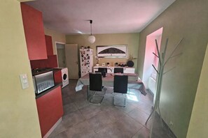 Private kitchen - At Emilien & Charline's: Single-Story Apartment (Cransac-les-Thermes)