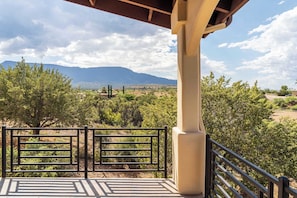A covered outdoor area with a view of a mountainous landscape. - Stunning Tuscany Style Home, Breathtaking 360 Views + Casita! (Cottonwood)