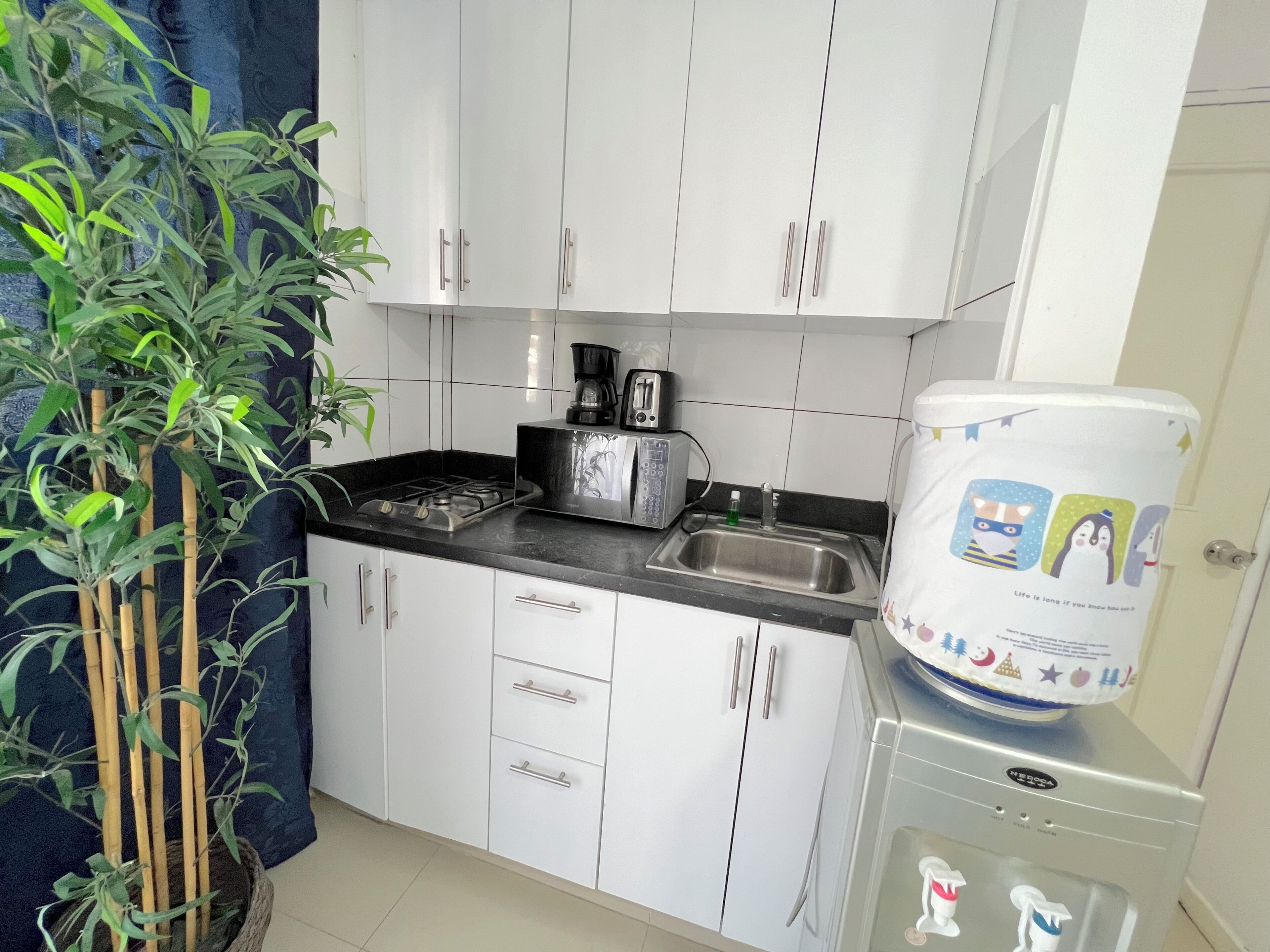 Estudio Confort, balcón | Cocina privada