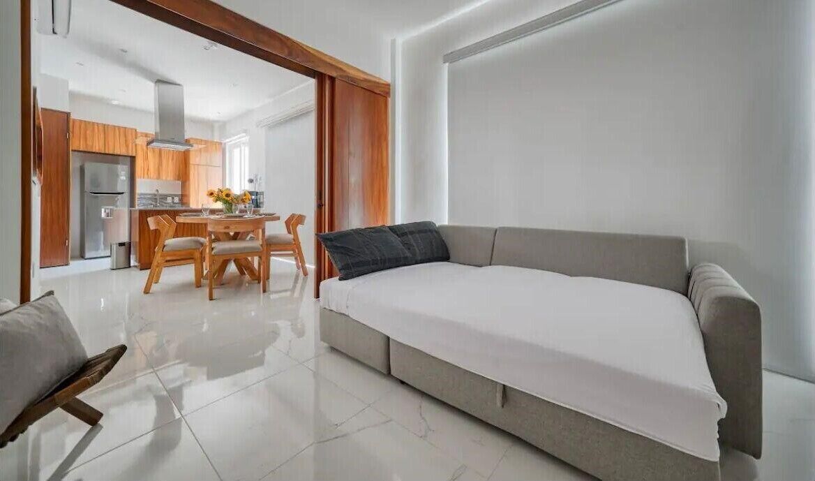 Apartamento superluxo | Área de estar | TV LED 50 polegadas com canais a cabo