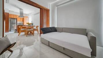 Apartamento superluxo | Área de estar | TV LED 50 polegadas com canais a cabo