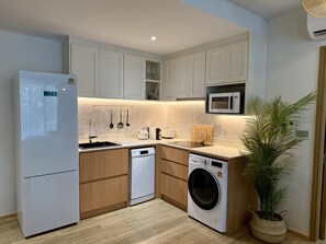 Private kitchen - Charming 2-bedroom apartment with AC in lovely Tambon Sa Khu (Tambon Sa Khu)
