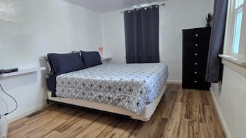 1 bedroom, desk, bed sheets