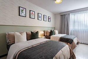 A hotel room with two beds, a wall-mounted lamp, and a large window with curtains. - Designer Apt in Roma Norte, Parking & Workspace (Mexico City)