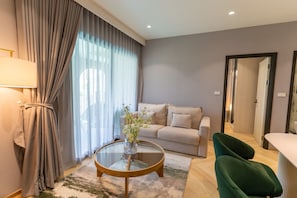 Living area - 2-bedroom apartment in tranquil Tambon Choeng Thale with AC and fitness room (Tambon Choeng Thale)