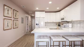 Coffee/tea maker, fridge, microwave, oven